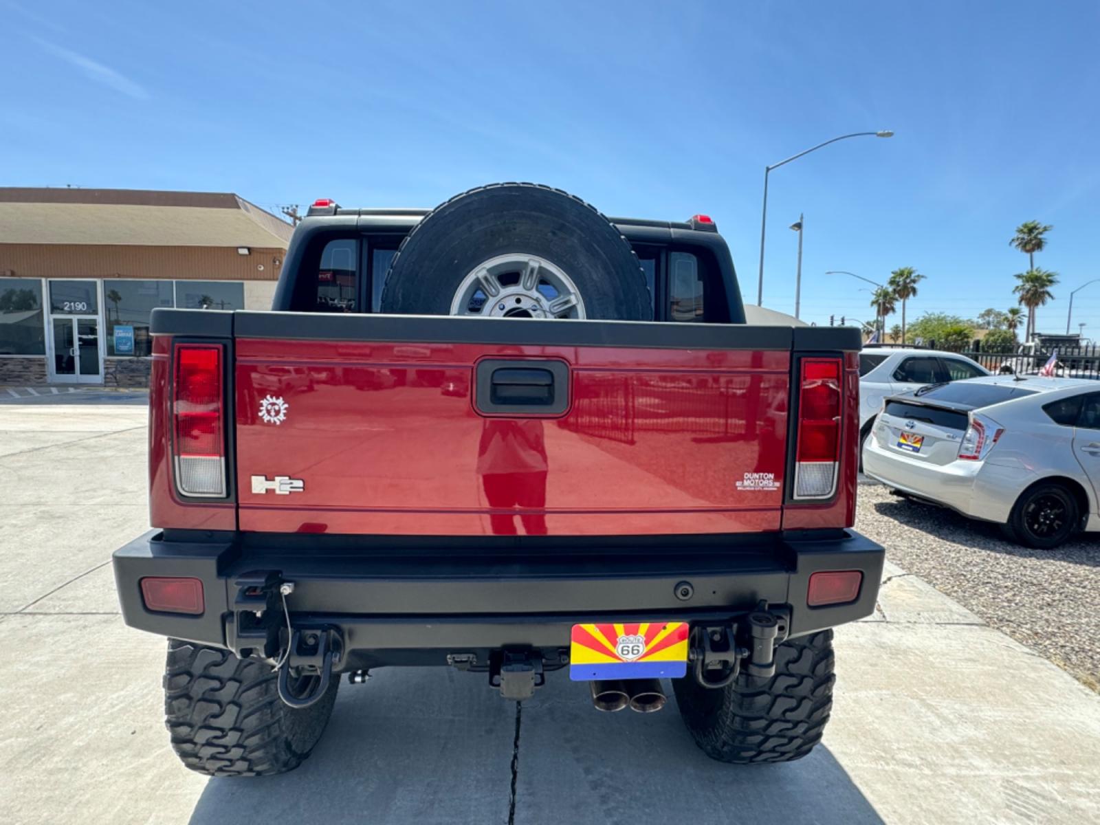 2005 Red /black Hummer H2 SUT , located at 2190 Hwy 95, Bullhead City, AZ, 86442, (928) 704-0060, 0.000000, 0.000000 - 2005 Hummer H2 SUT. only 92k miles. 6.0 V8 4 wheel drive. New transmission with warranty. New shocks. lots of extras .onstar. backup camera, custom stereo. fabtech 6 in lift with 40 in tires. Big Bad Hummer. $22900. Free and clear title. - Photo #7